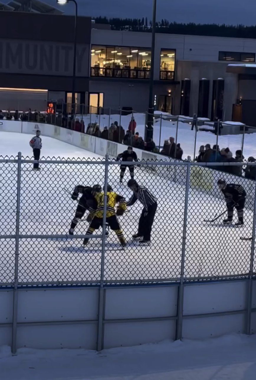 Bozeman and Sun Valley line up for a face off during the outdoor game in Big Sky (Photo: Bozeman Stingers)