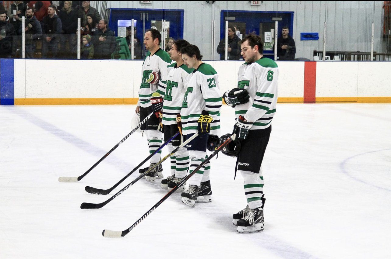 Montana Tech players for the National Anthem at the Butte Community Ice Center.   Pictured: L-R Brad Rutherford, Mike McKay, Sam DeMelo, Nolan Samples  (BnO Photography) 