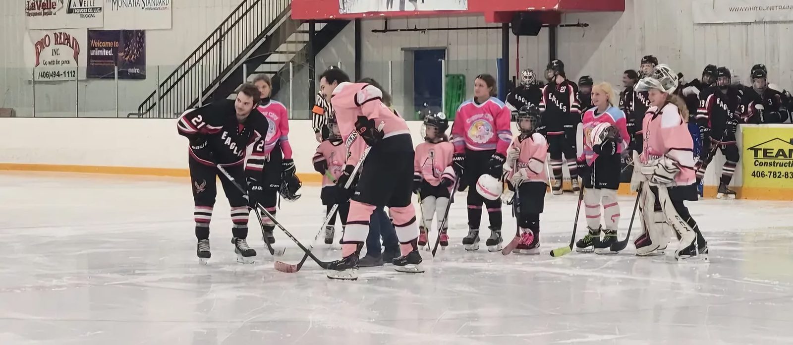 Ceremonial Puck Drop for “Pink the Rink” Night (Photo: MT Tech Hockey)