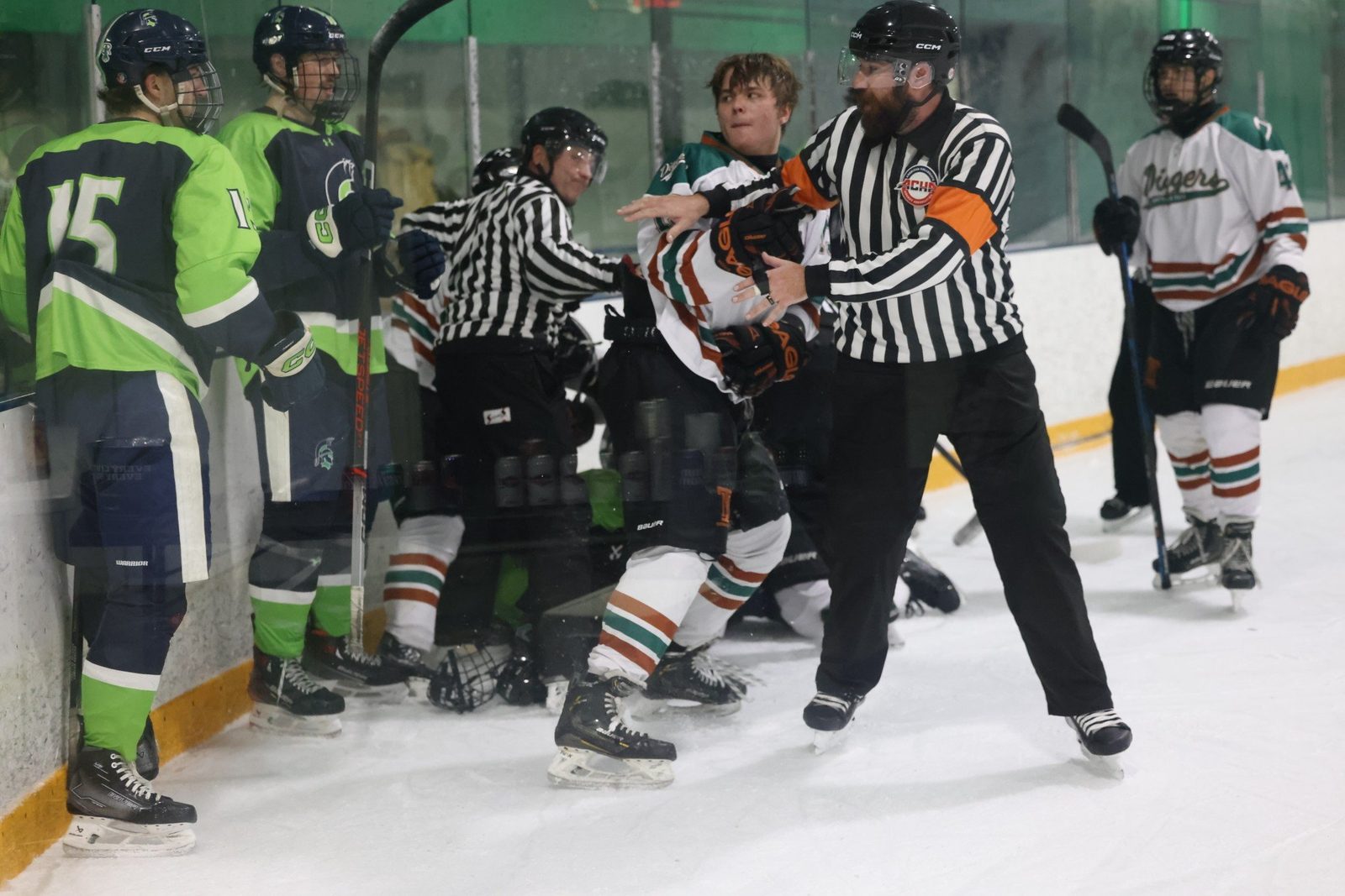 Sean Ripplinger is pulled away from scrum after a late shot (Photo Credit: Lisa Schake)